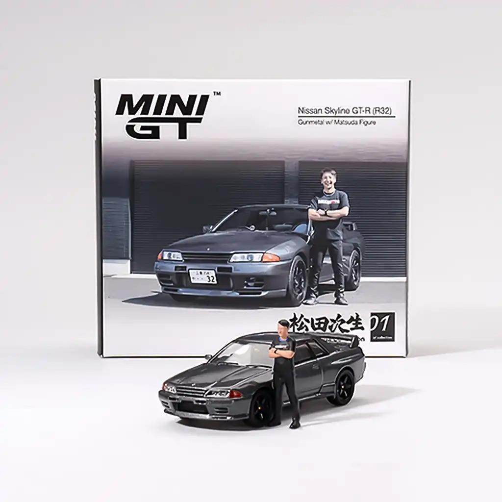 Mini GT 1:64 — Nissan Skyline GT-R (R32) | Gunmetal | w/ Matsuda Figure | Die-Cast Collectible